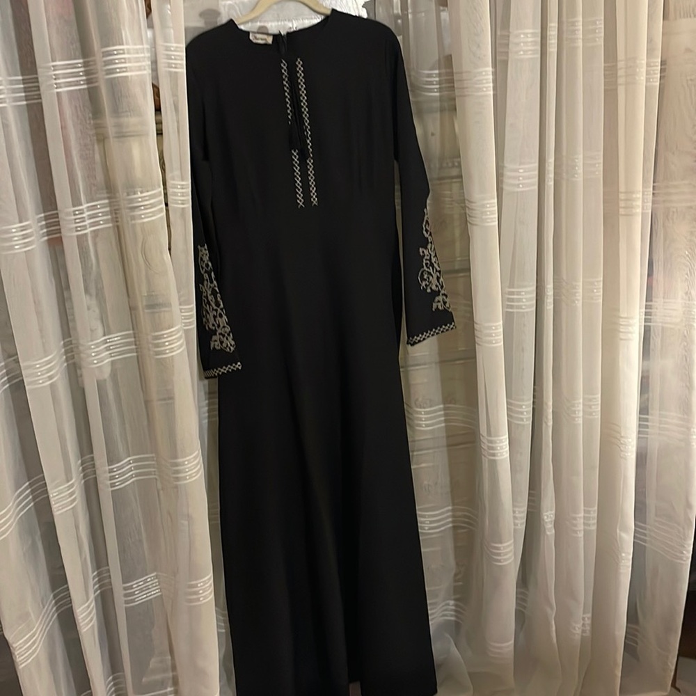 NWOT 57 inches long with stretch size 40 made by Burum